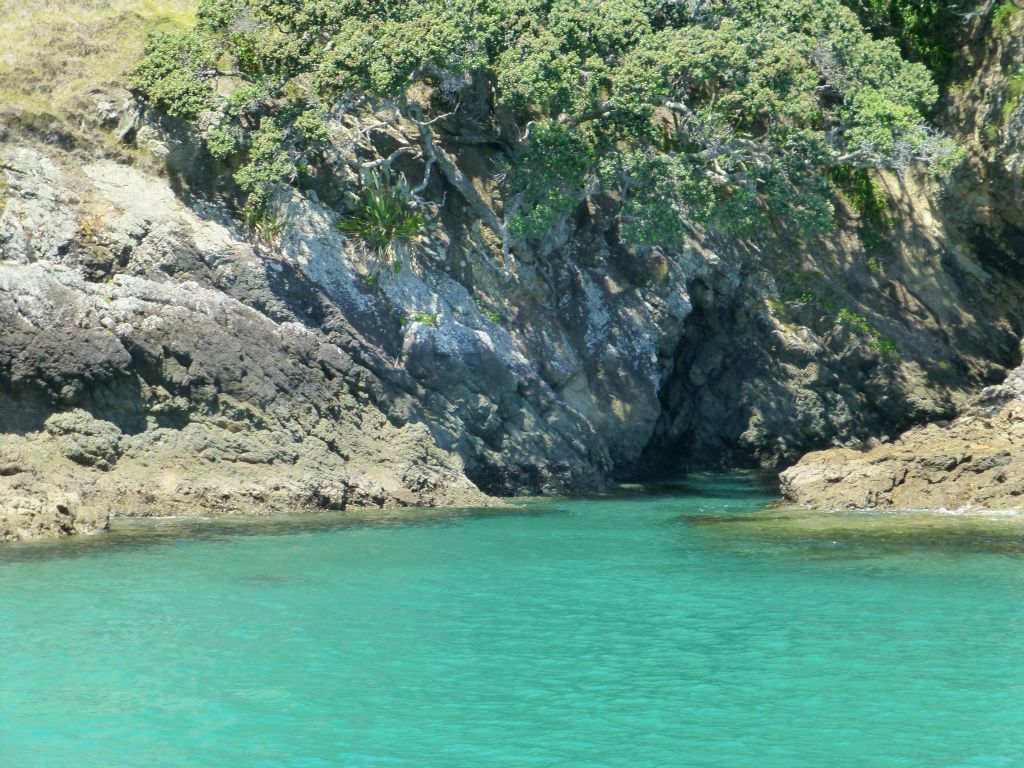 The renowned 'Hole in the Rock' cruise aboard Fullers.  Bay of Islands.