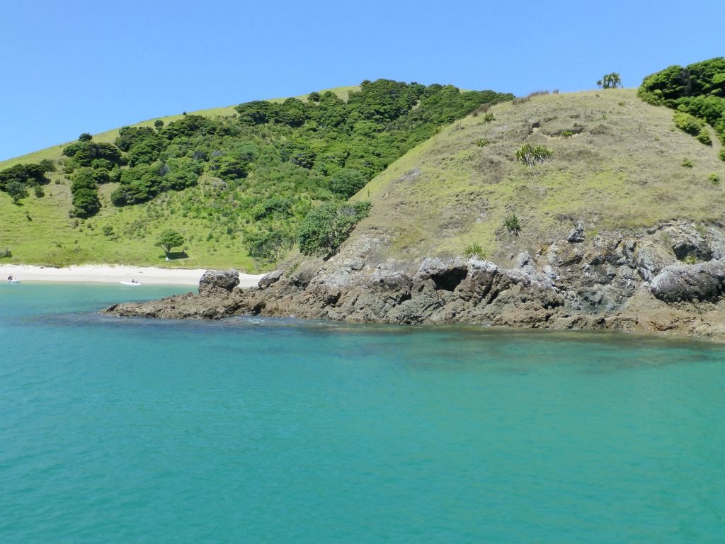 The renowned 'Hole in the Rock' cruise aboard Fullers.  Bay of Islands.