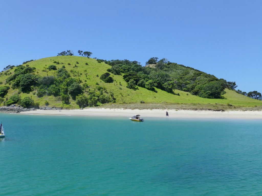 The renowned 'Hole in the Rock' cruise aboard Fullers.  Bay of Islands.