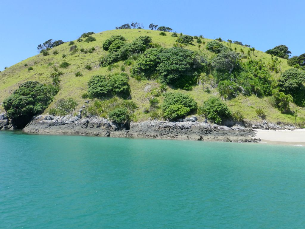 The renowned 'Hole in the Rock' cruise aboard Fullers.  Bay of Islands.