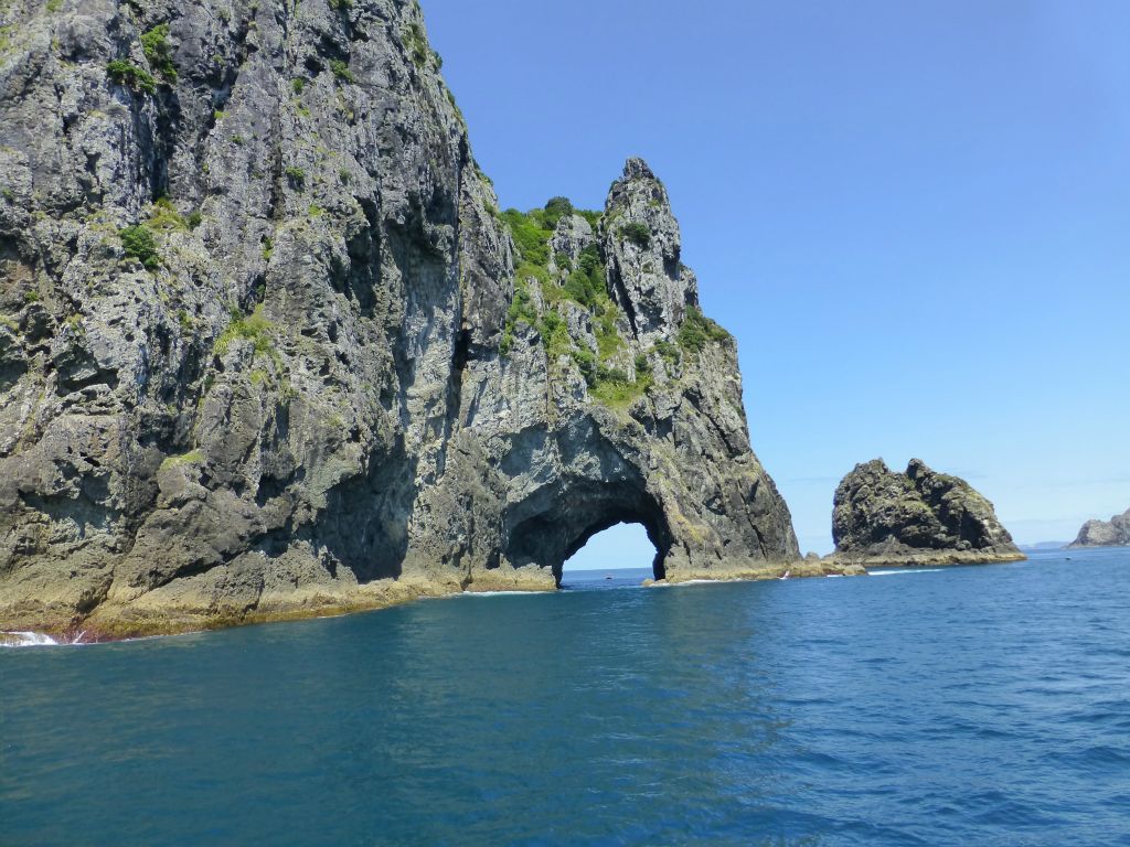 The renowned 'Hole in the Rock' cruise aboard Fullers.  Piercy Island - and the 'hole' - Bay of Islands.