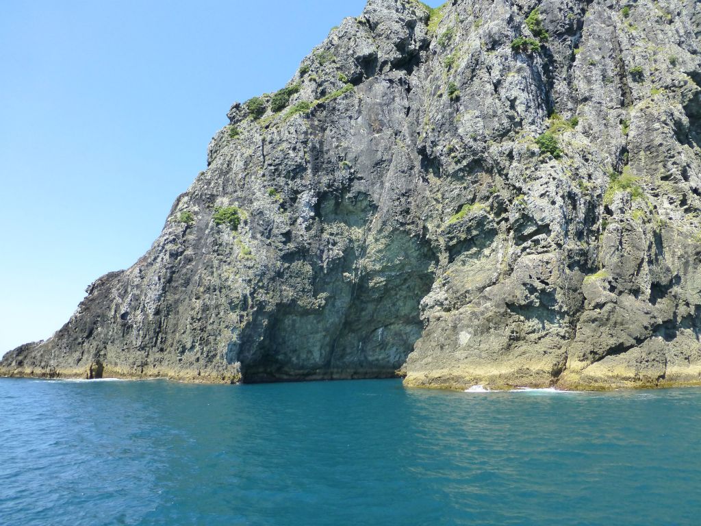 The renowned 'Hole in the Rock' cruise aboard Fullers.  Piercy Island - and the 'hole' - Bay of Islands.