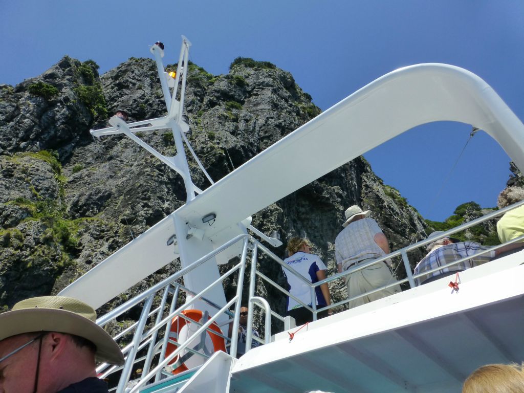 The renowned 'Hole in the Rock' cruise aboard Fullers.  Piercy Island - and the 'hole' - Bay of Islands.