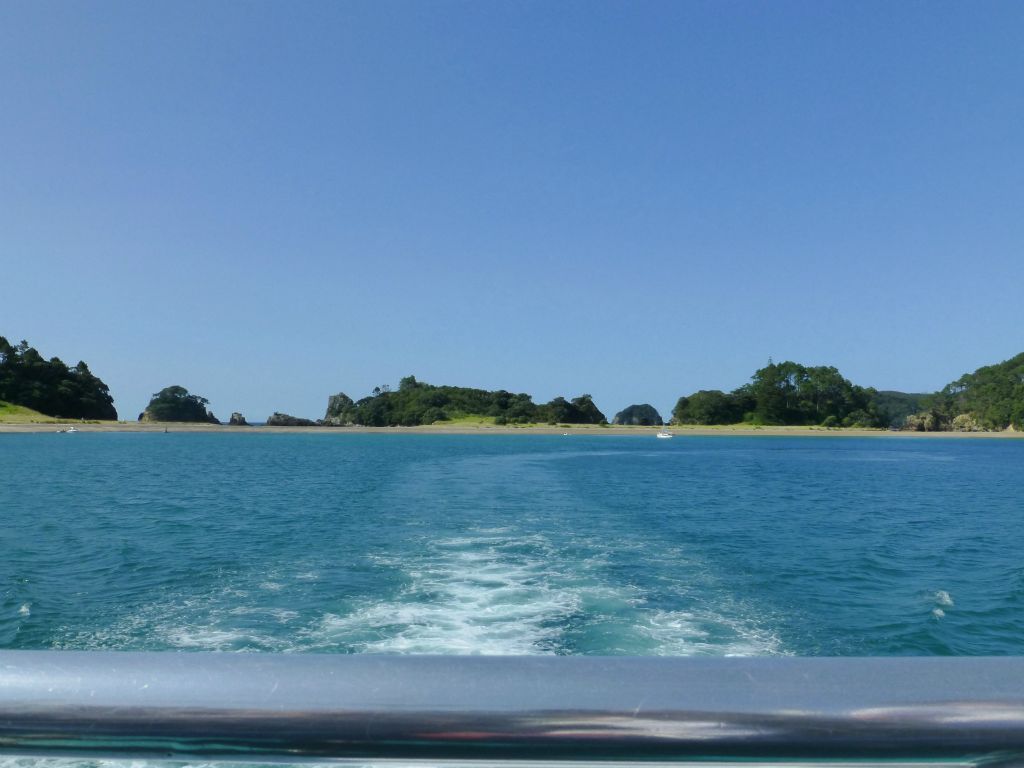 The renowned 'Hole in the Rock' cruise aboard Fullers.  Bay of Islands.